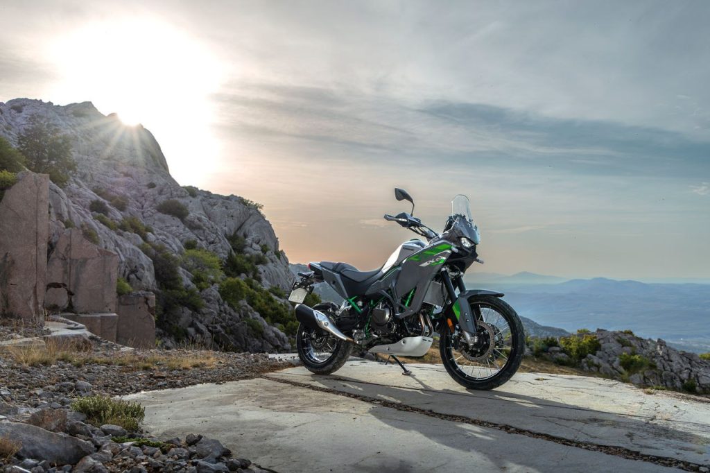 The 2027 Kawasaki KLE650 SE at a scenic mountain viewpoint.